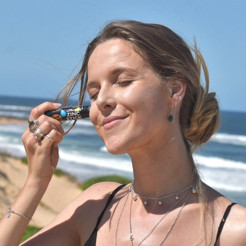 Sun Zapper Light Skin Tone on woman at beach, Sun Zapper Zinc Sticks, Dunedin New Zealand
